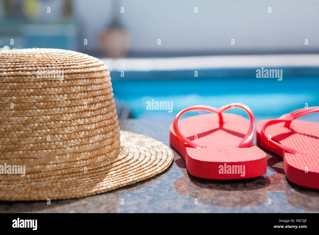 straw-hat-and-flip-flops-out-of-focus-stock-photo-alamy