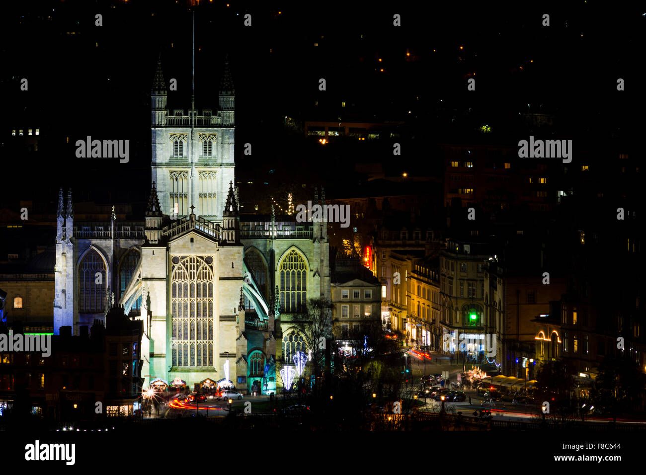 View of Bath Abbey at night from hills above the UNESCO World Heritage City of Bath, with Christmas market Stock Photo