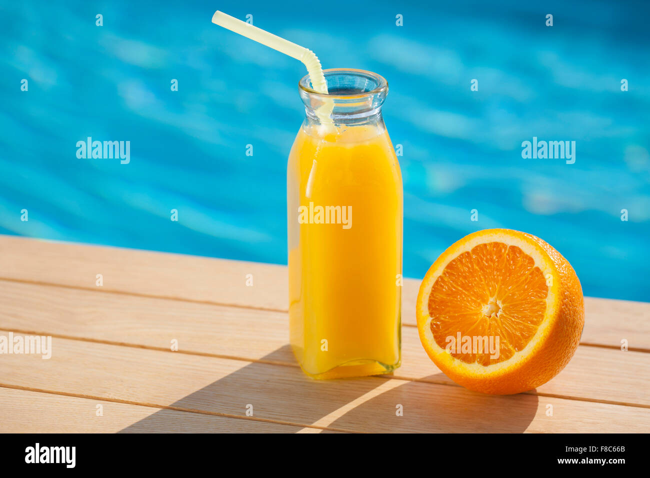 Orange slice and orange juice out of focus Stock Photo Alamy