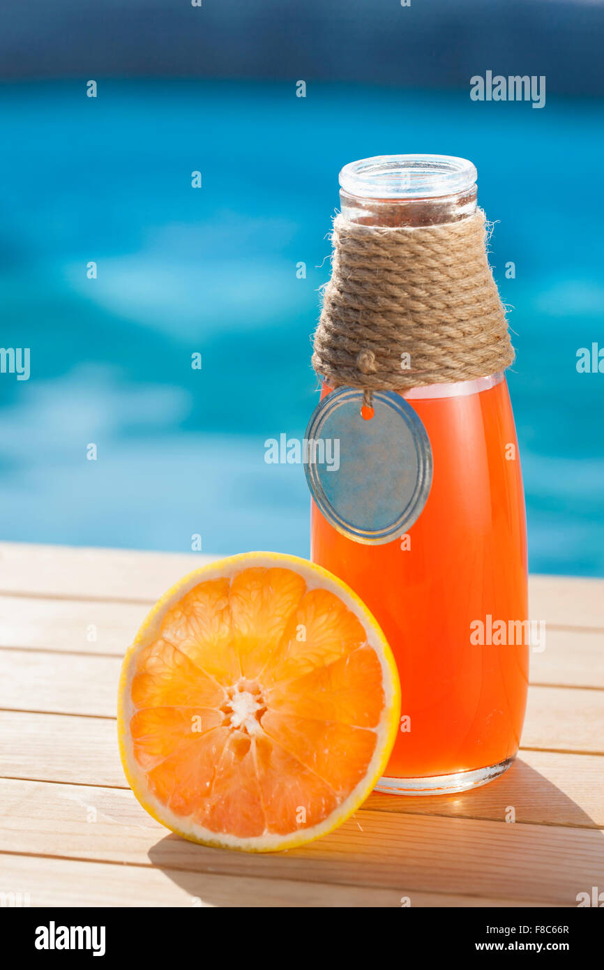 Orange slice and orange juice out of focus Stock Photo Alamy