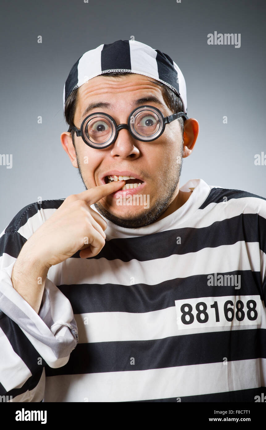 Funny prison inmate in concept Stock Photo - Alamy