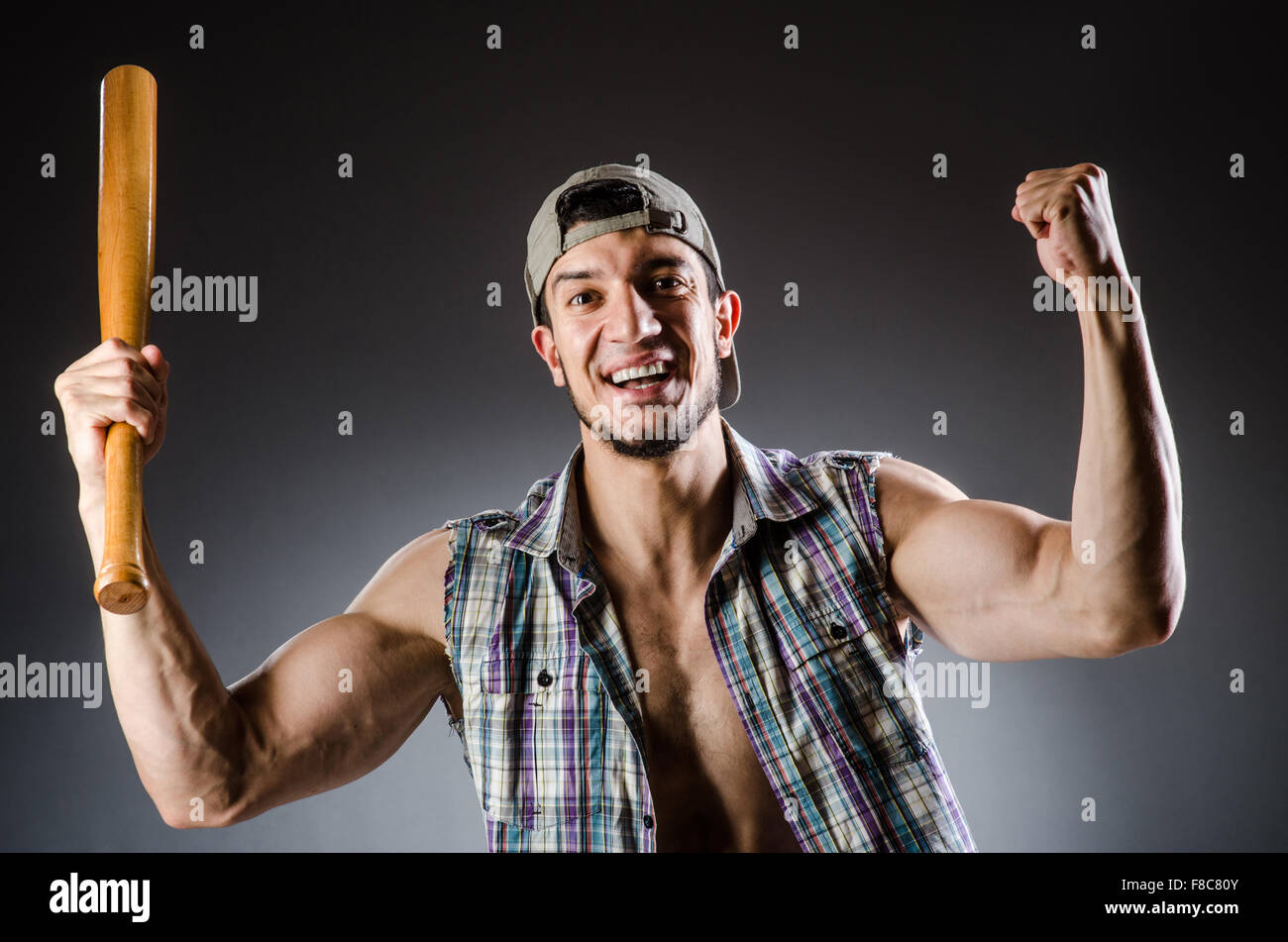 Violent man with baseball bat and hat Stock Photo Alamy