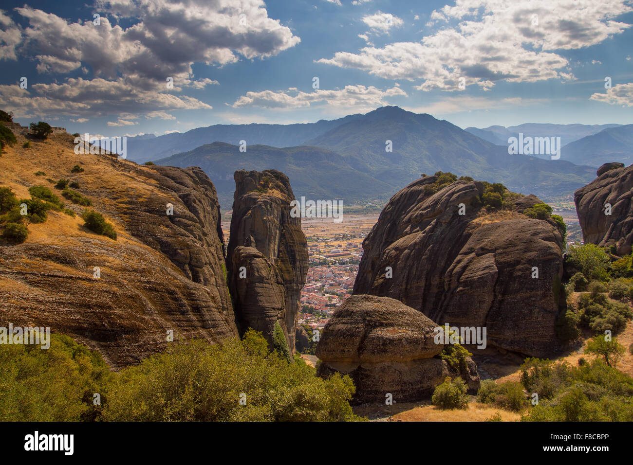 Beautiful scenery of cliffs at the edge of the beautiful valley of Meteora. In ancient and high cliffs are ancient monasteries. Stock Photo