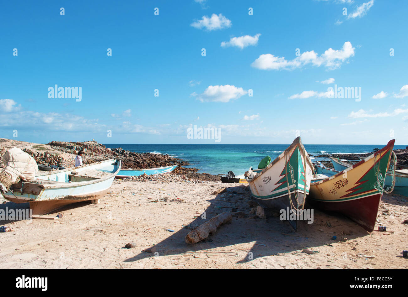 Yemen: boats on the beach in the protected area of Ras Erissel, the eastern cape of Socotra, the meeting point of the Arabian sea and the Indian Ocean Stock Photo