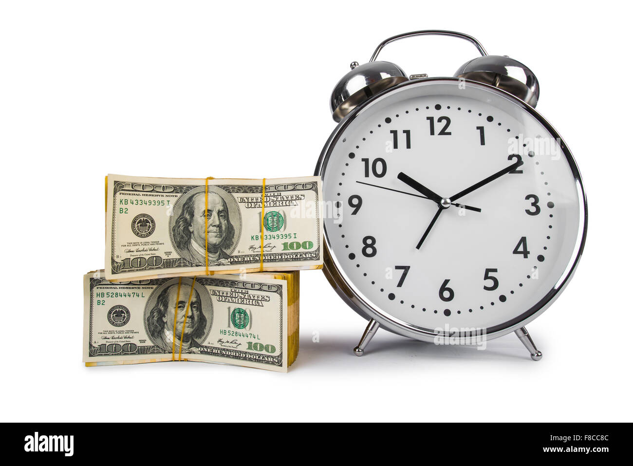 Time is money concept with clock and dollars Stock Photo - Alamy