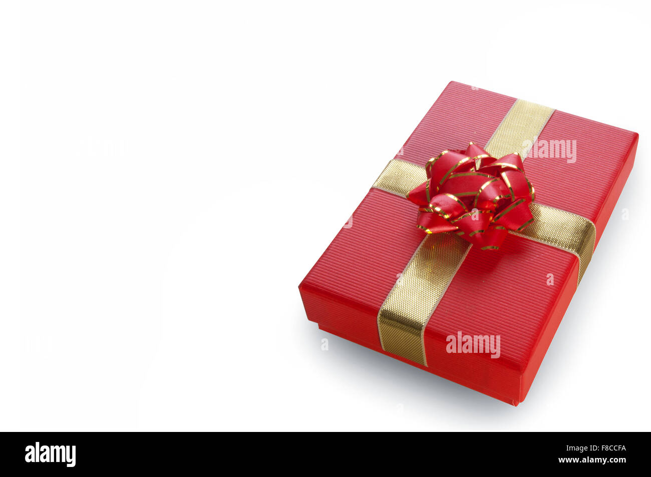 Red Christmas gift box over a white background with space Stock Photo ...