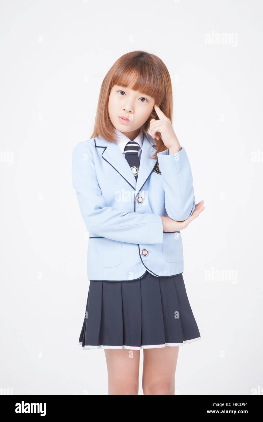 Elementary School Girl In School Uniforms With Short Hair