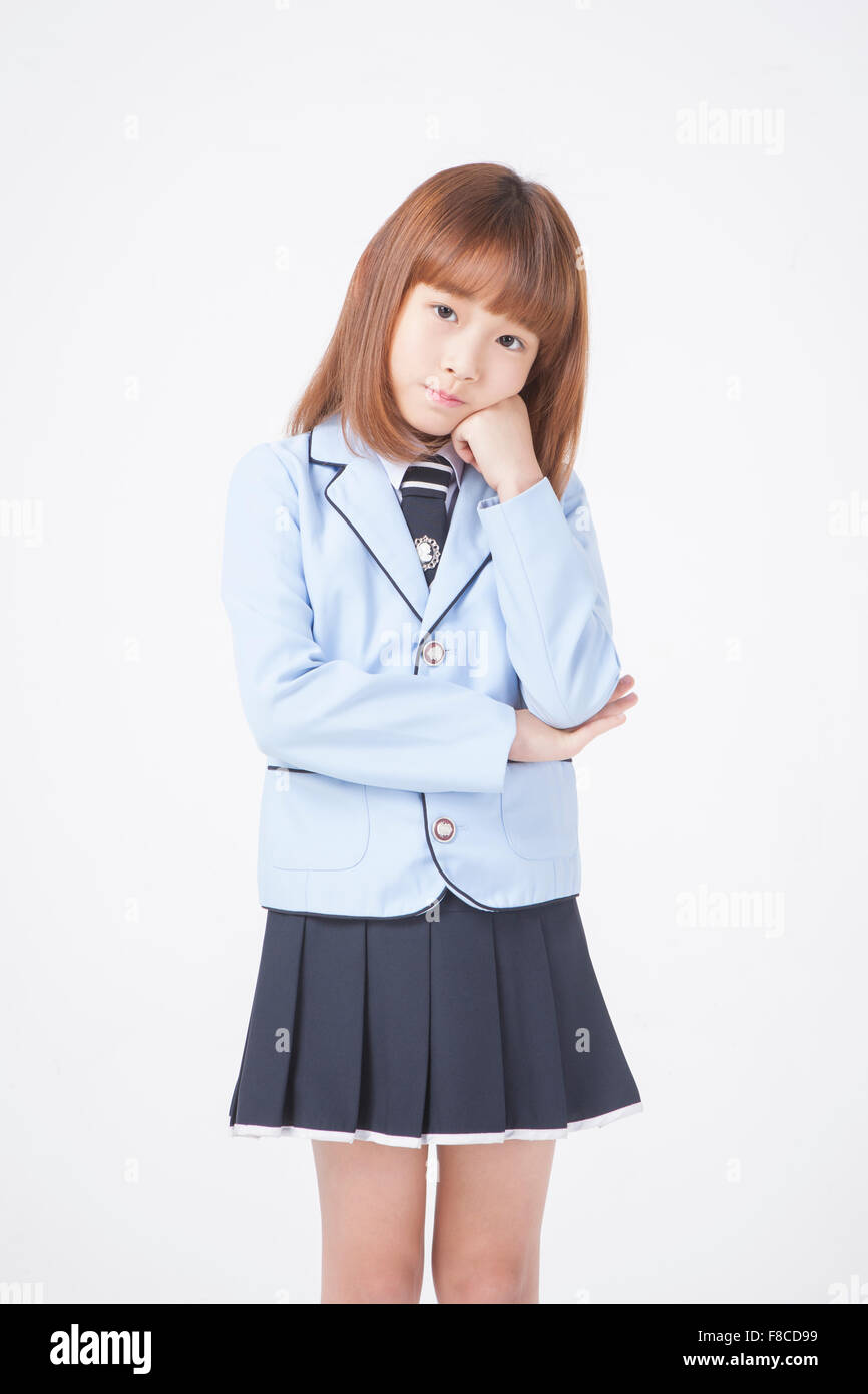 Elementary School Girl In School Uniforms With Short Hair