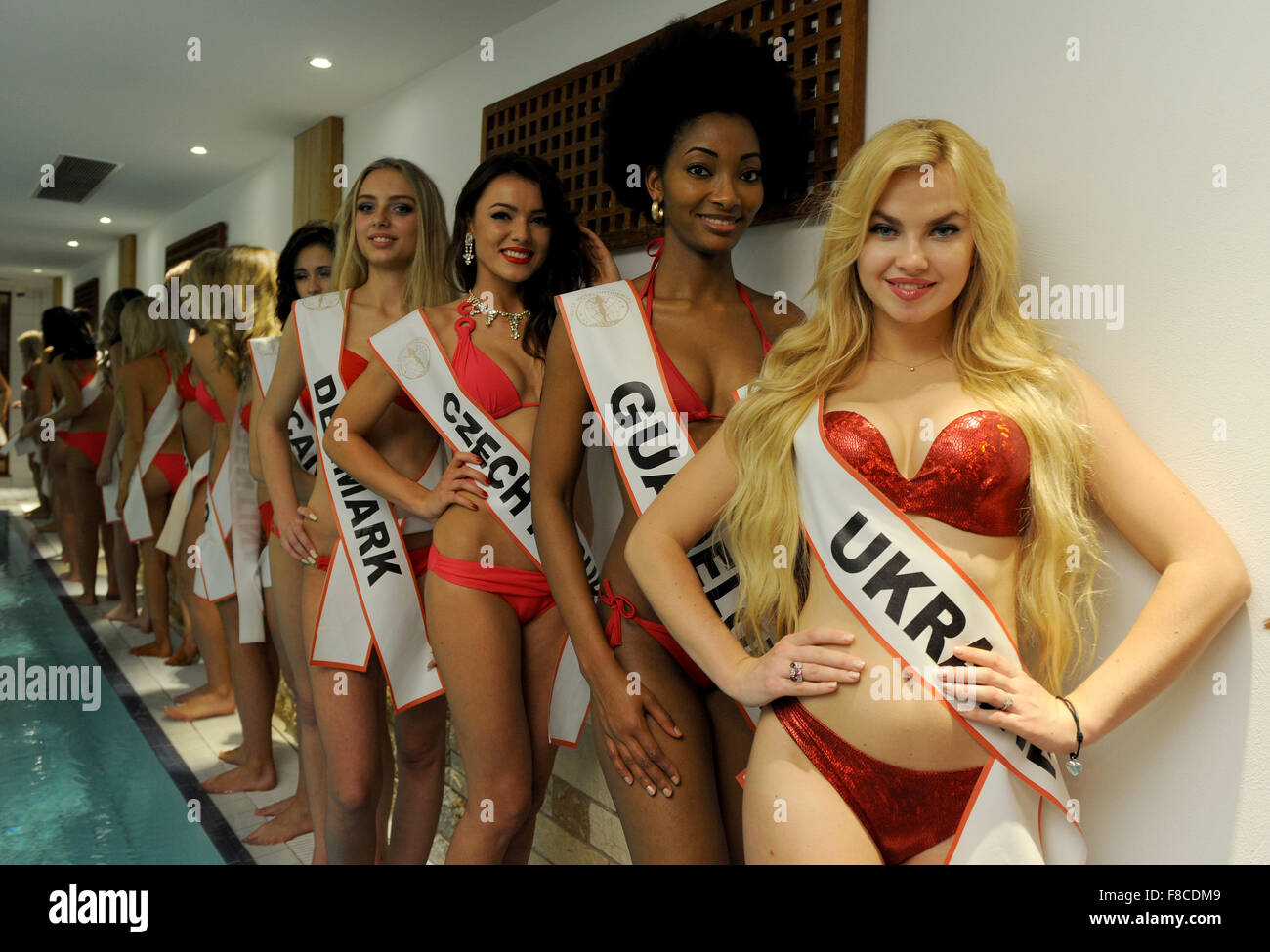 Dazia Sheibo of Ukraine (R-L), Saida Nineth Jeronimo of Guadeloupe, Veronika Thielowa of the Czech Republic and Amalie Nygaard of Denmark, who will compete for the 'Miss Intercontinental 2015' title on 18 December, pose at a hotel swimming pool in Bremen, Germany, 08 December 2015. Women from 64 countries and five continents will be taking part in the beauty pageant. Photo: INGO WAGNER/dpa Stock Photo