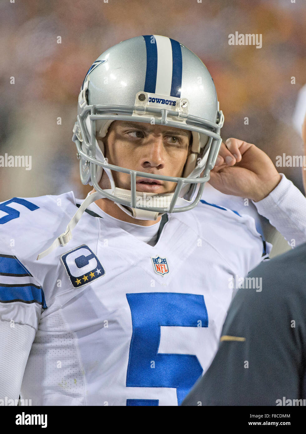 Dallas Cowboys kicker Dan Bailey (5) returns to the bench after kicking