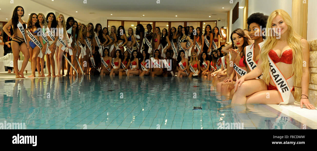 Dazia Sheibo of Ukraine (R-L), Saida Nineth Jeronimo of Guadeloupe and Veronika Thielowa of the Czech Republic, who will compete for the 'Miss Intercontinental 2015' title on 18 December, pose at a hotel swimming pool in Bremen, Germany, 08 December 2015. Women from 64 countries and five continents will be taking part in the beauty pageant. Photo: INGO WAGNER/dpa Stock Photo