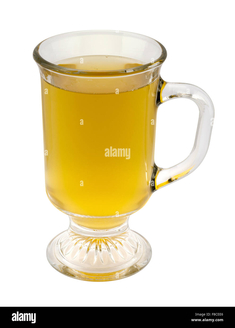 Green Tea in a Glass Cup. The image is a cut out, isolated on a white background. Stock Photo