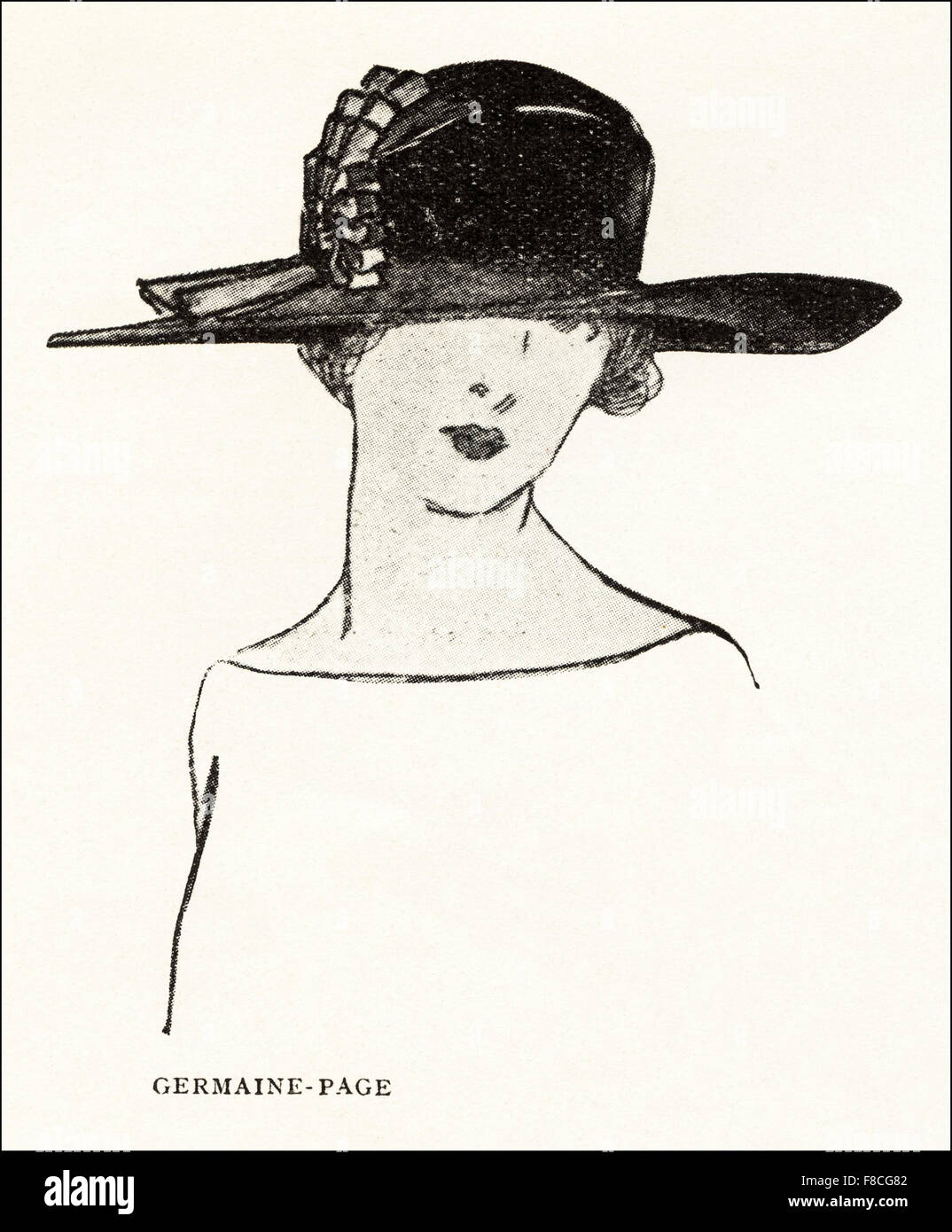 Paris fashion of 1923. Flapper fashion of the 1920s. Wide brimmed hat of black velvet trimmed with black mauve & yellow ribbon by designer Germaine-Page. Stock Photo