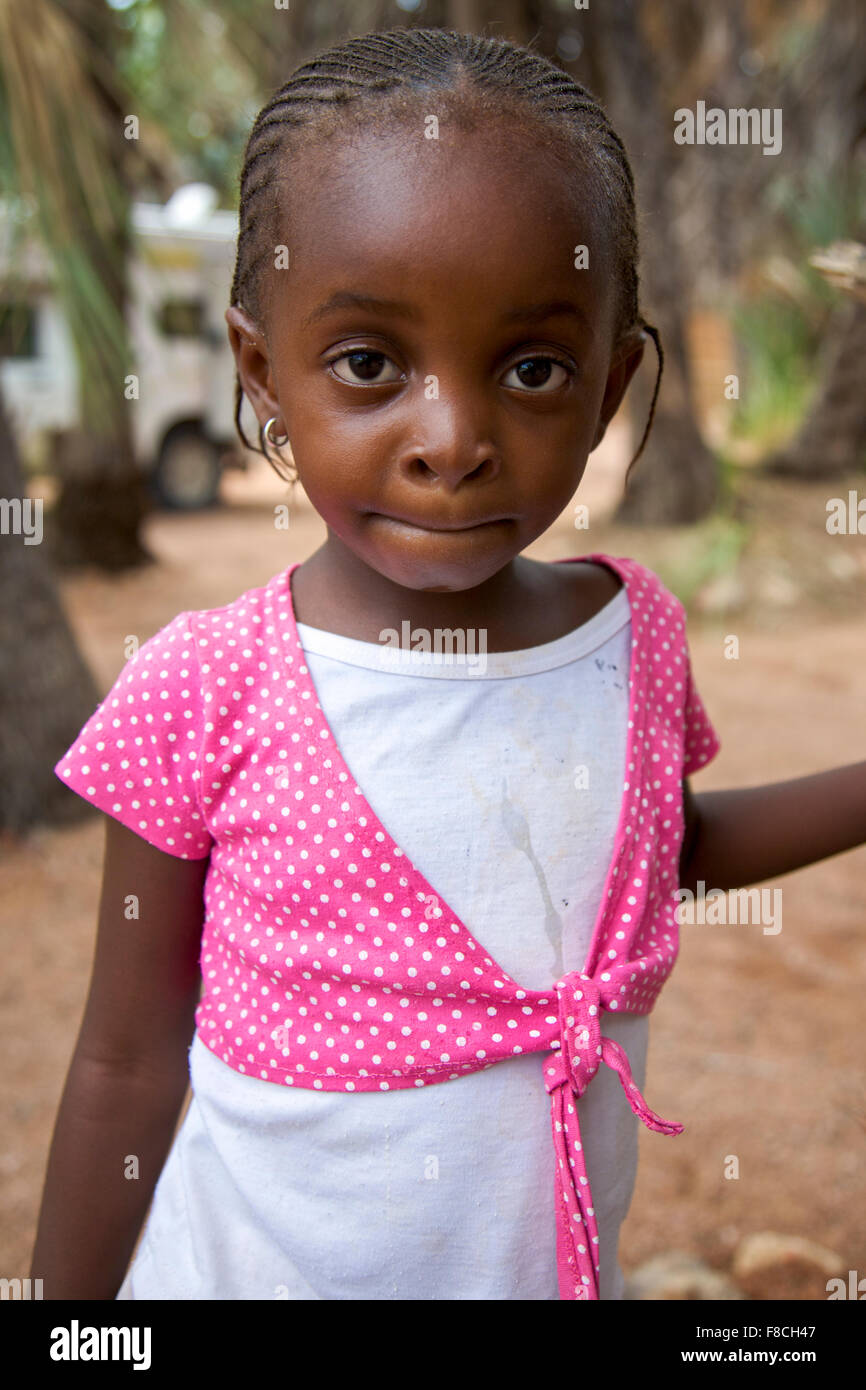 Portrait of a young kid from the Himba tribe, Namibia Stock Photo