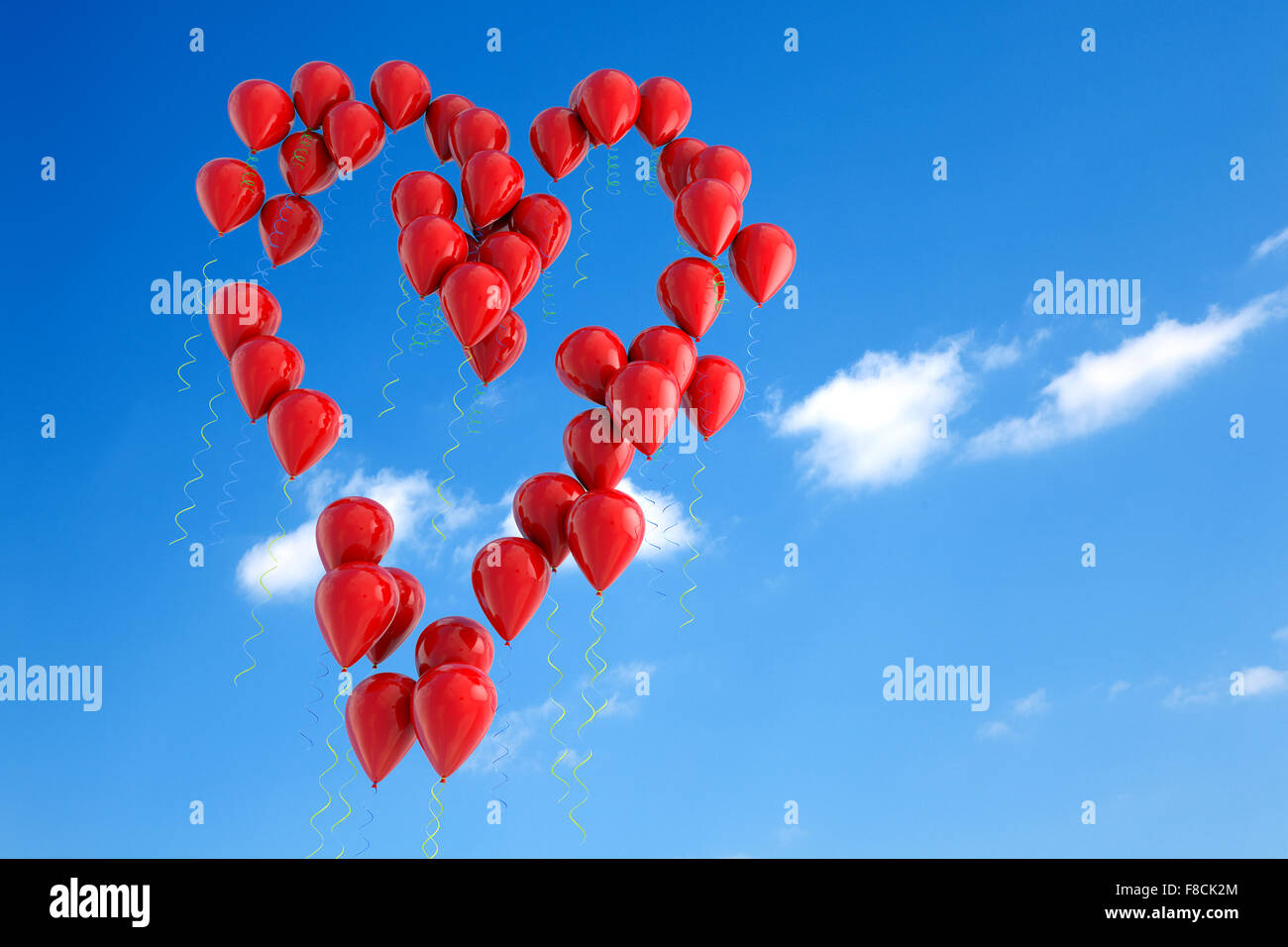 Balloons floating in the sky with heart shape Stock Photo - Alamy