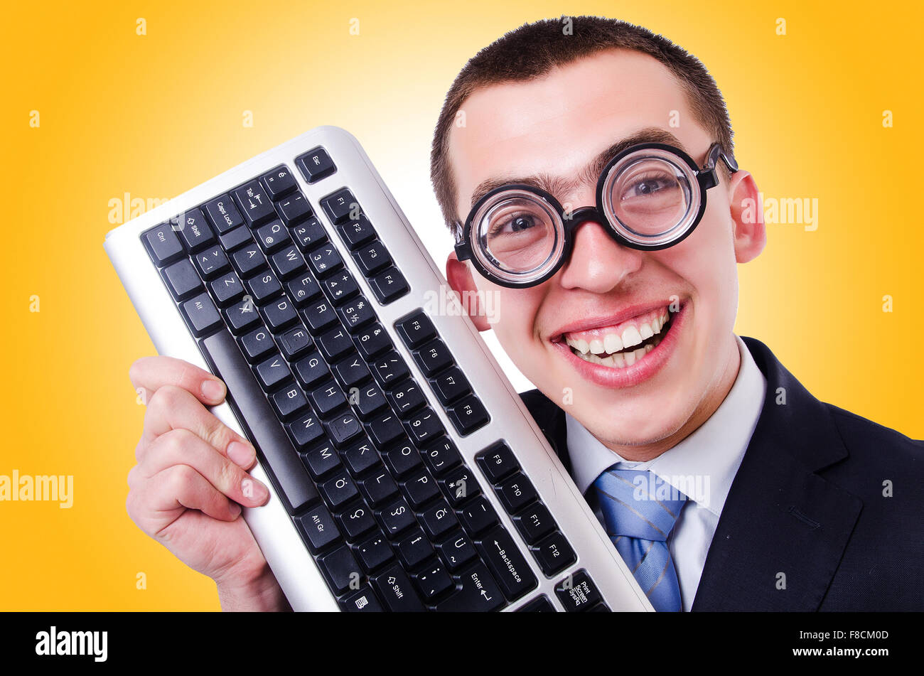 Computer geek nerd in funny concept Stock Photo - Alamy