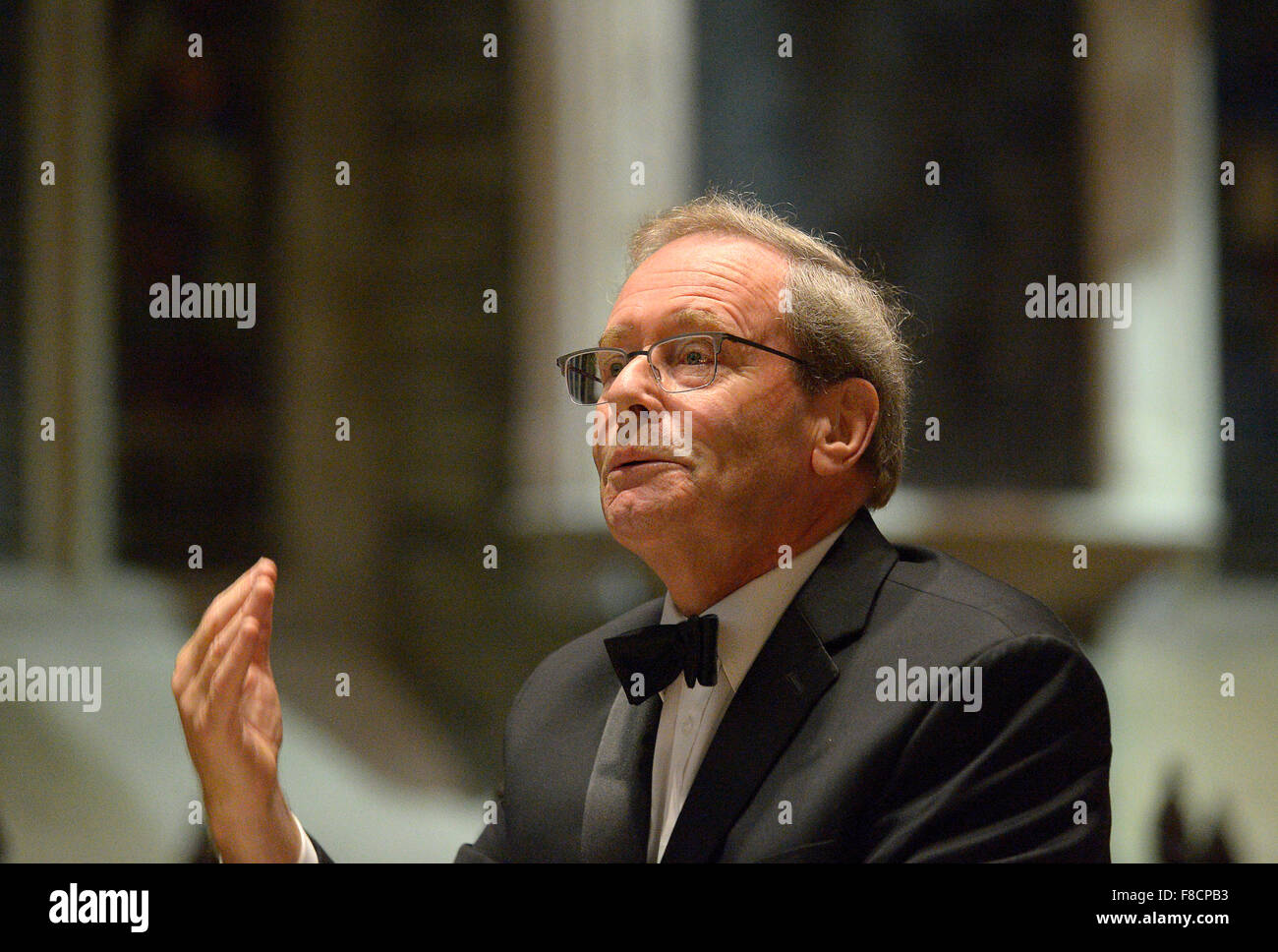 Simon Irving, Musical Director, conducting the Canadian Orpheus Male Choir in St Columb’s Cathedral, Londonderry, Northern Irela Stock Photo