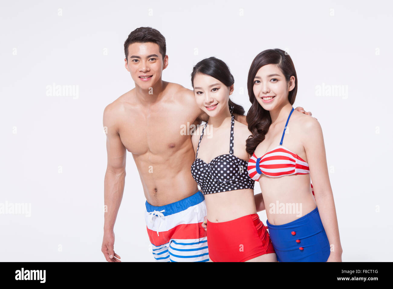 Three Teenage Girls (16-17) Wearing Bikinis Pictured Against Sky Portrait  Stock Photo, Picture and Royalty Free Image. Image 19522563.