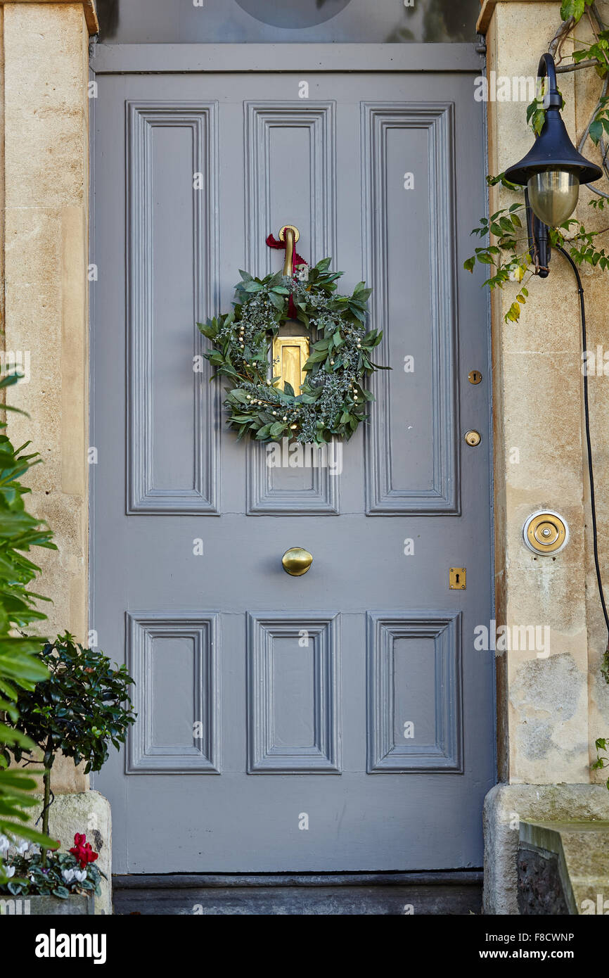Christmas Wreath on grey front door Stock Photo Alamy