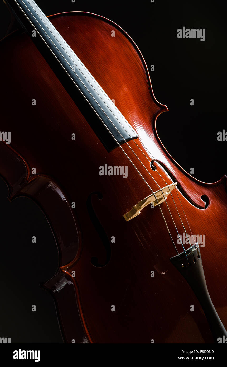Violin in dark room - music concept Stock Photo - Alamy
