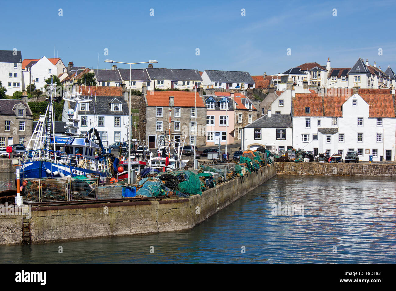 fishing boats in harbour Stock Photo - Alamy