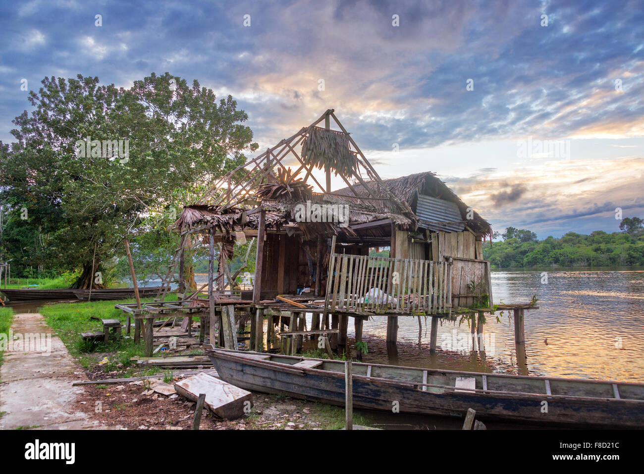 Old run down shack on the Javari River in the Amazon rain forest in Brazil Stock Photo