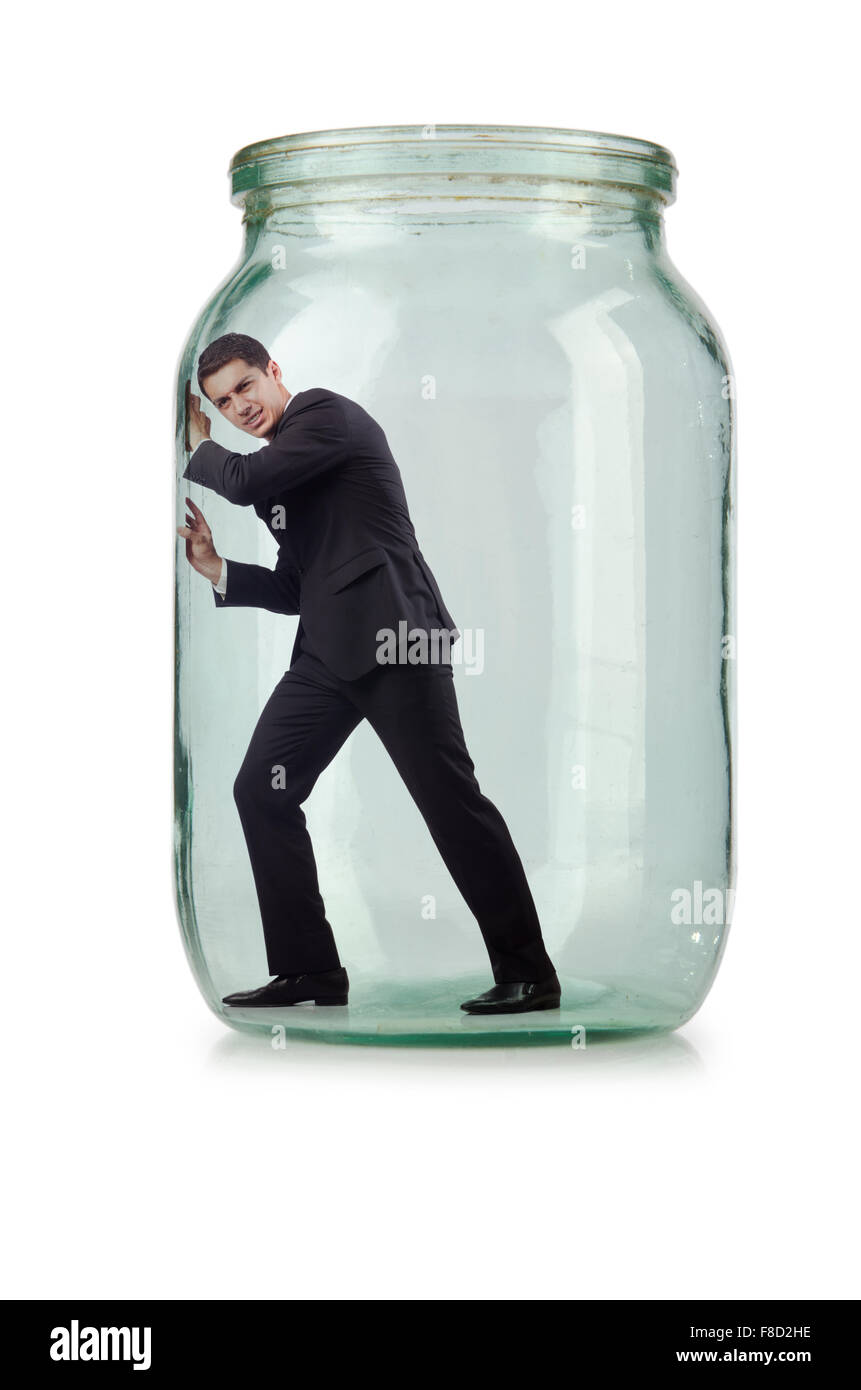 Young businessman in glass jar Stock Photo