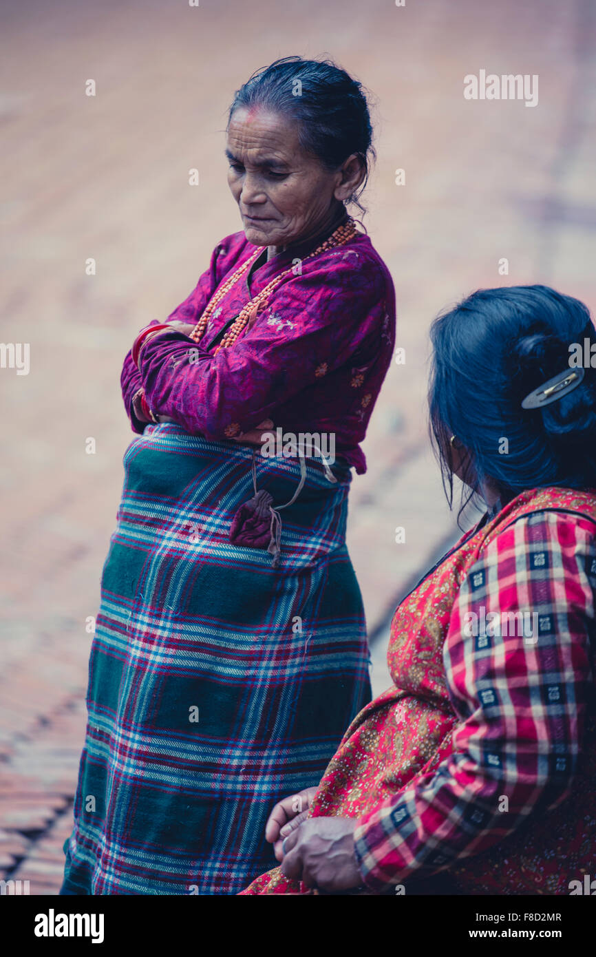 Old Nepalese women talking in the street of Bhaktapur Stock Photo