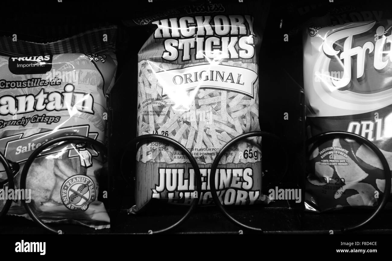 Snacks displayed in a vending machine Stock Photo