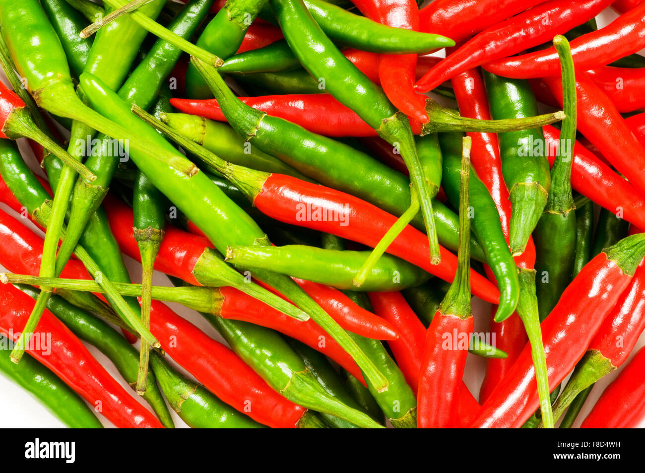 Red and green chili peppers at the background Stock Photo - Alamy