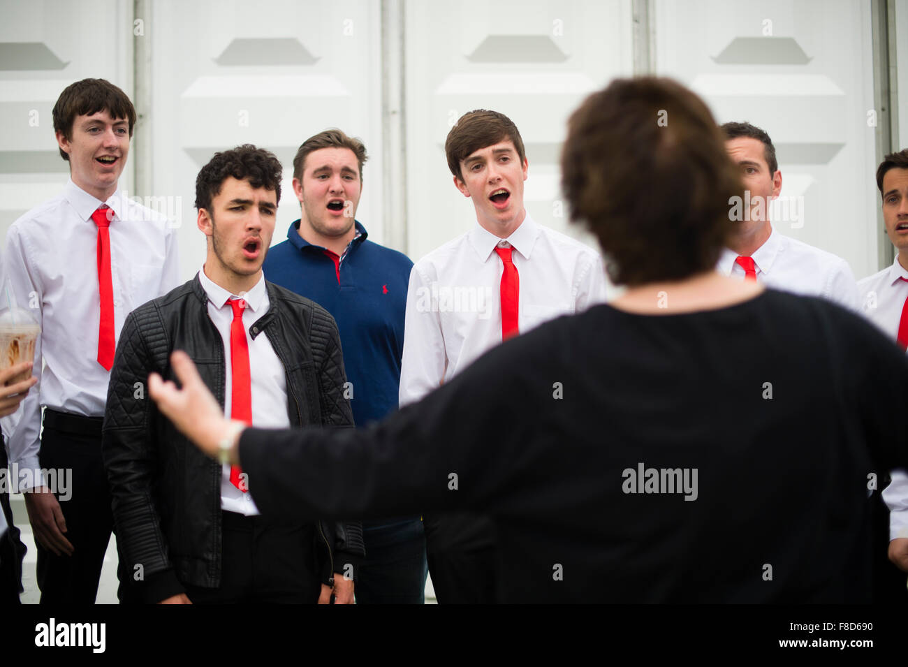 A male voice choir rehearsing before competing at The National Eisteddfod of Wales , held near Meifod village in Powys, mid Wales, August 2015 Stock Photo