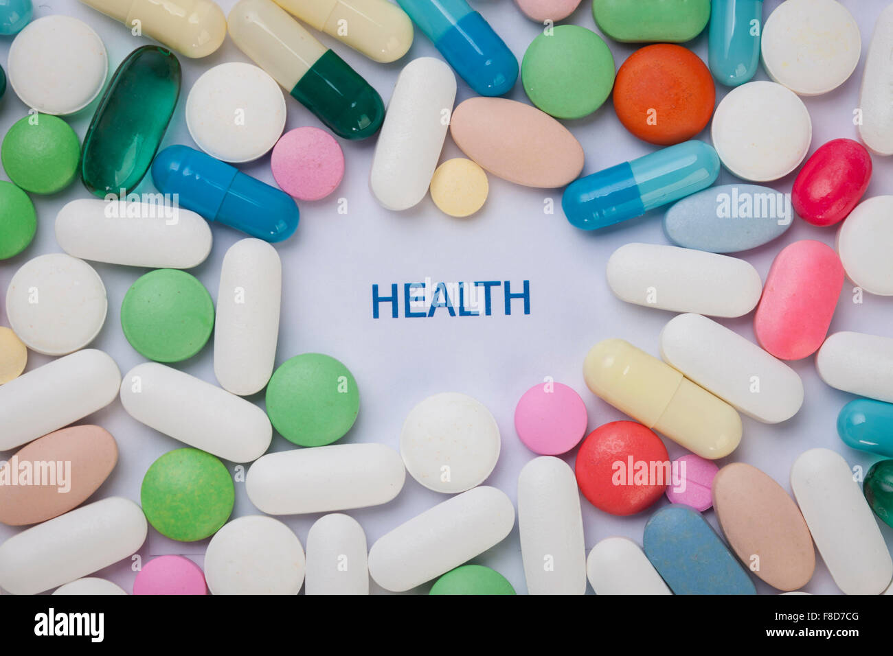 Word HEALTH written in a frame made with different types of medicine