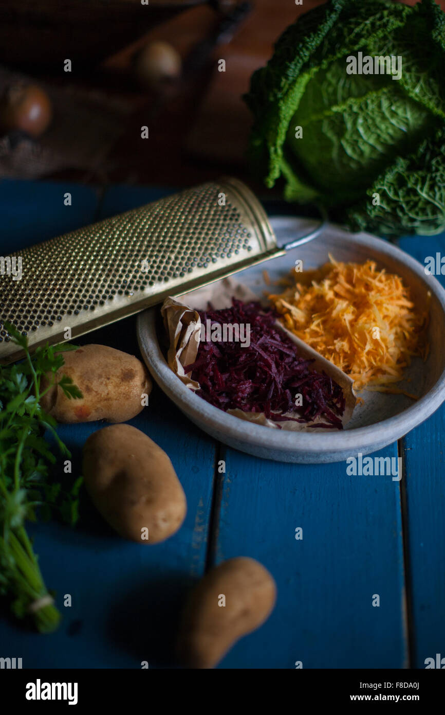 Electric Grater Cuts Raw Potatoes Stock Photo, Picture and Royalty Free  Image. Image 121450696.