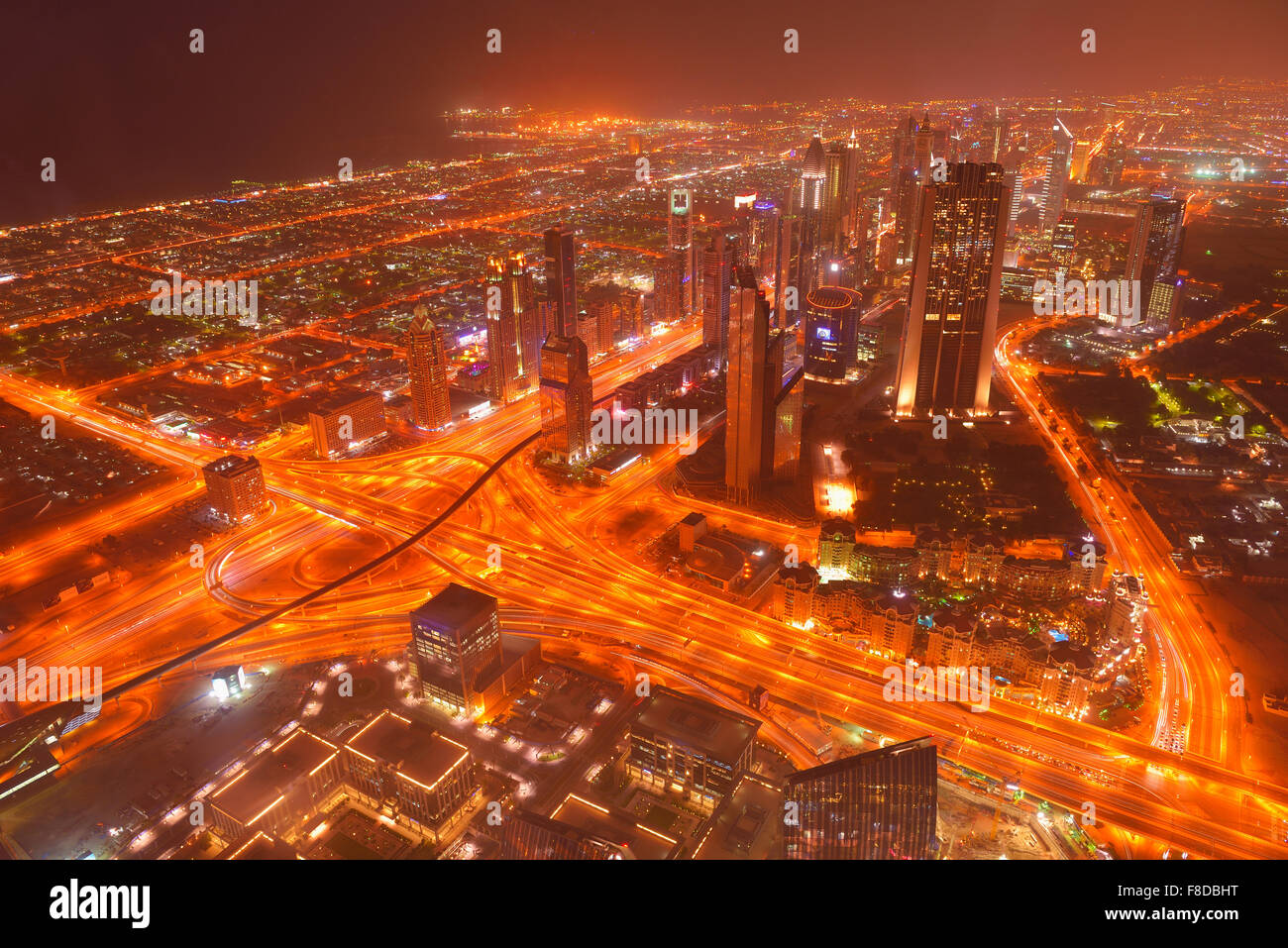 dubai-city-skyline-main-road-and-new-skyscrapers-at-sunset-stock-photo