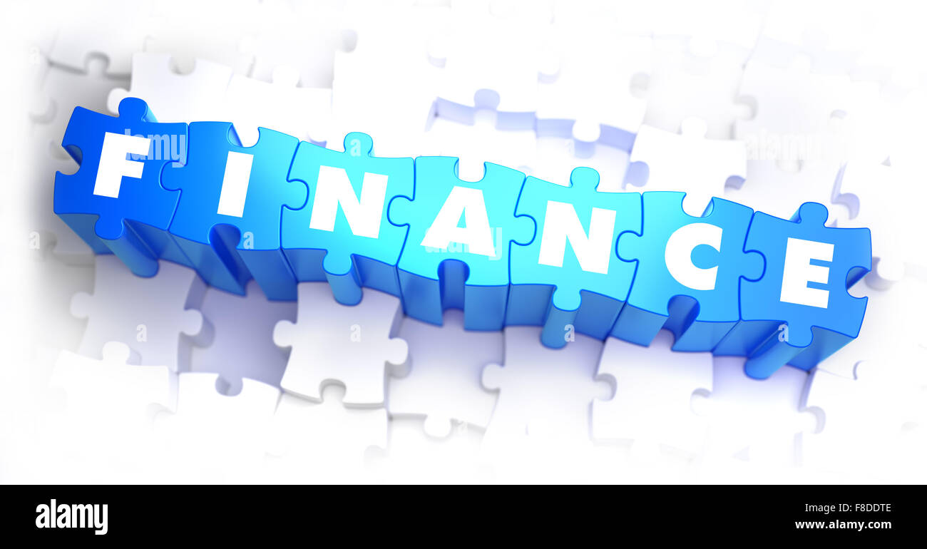 Finance - White Word on Blue Puzzles. Stock Photo