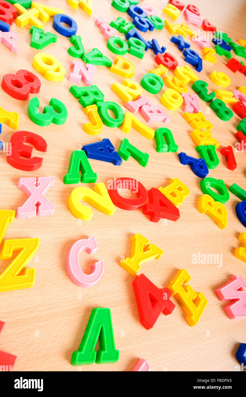 Children letters digits on table hi-res stock photography and images ...