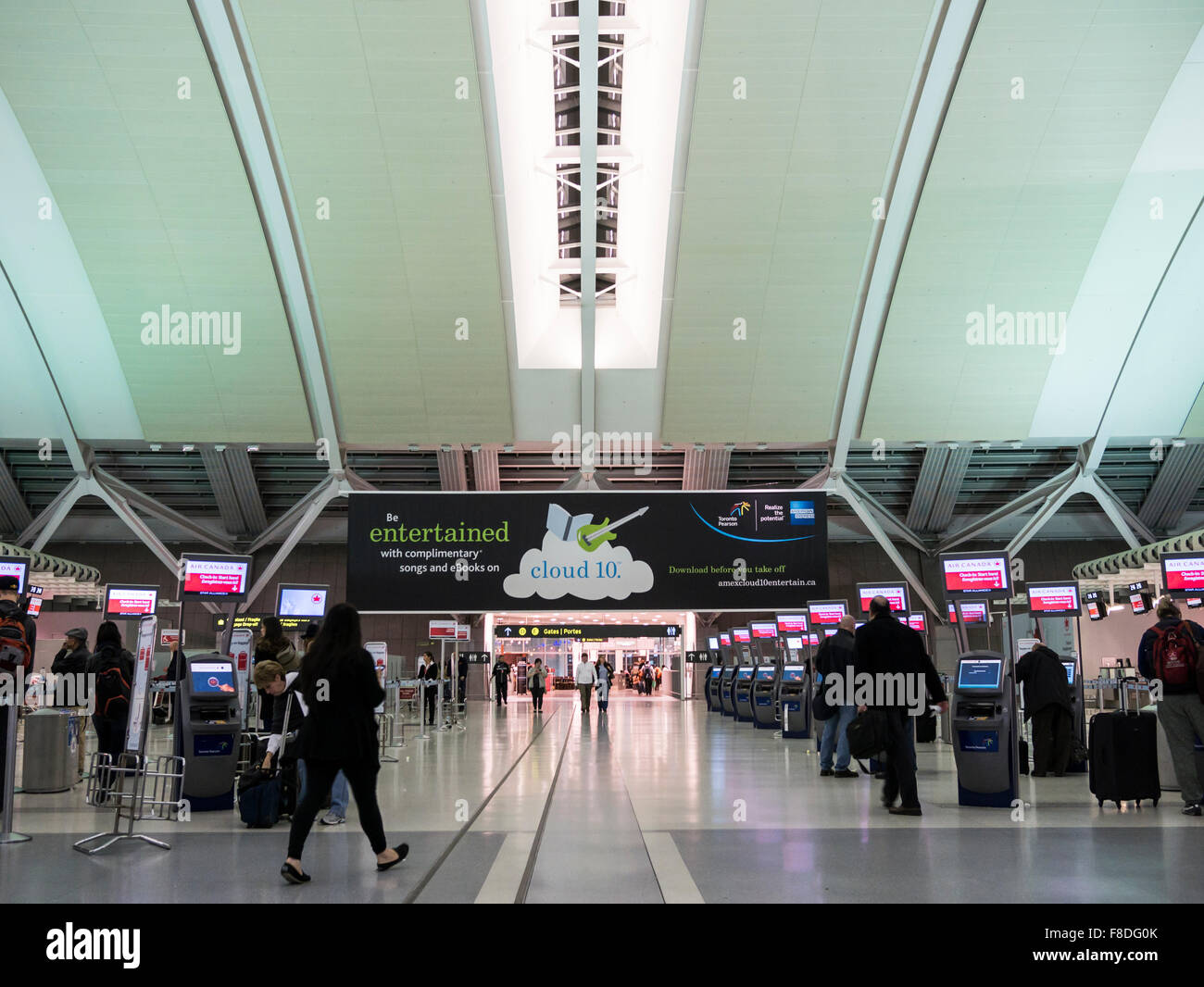 Passengers in Toronto international airport departure terminal. Stock Photo