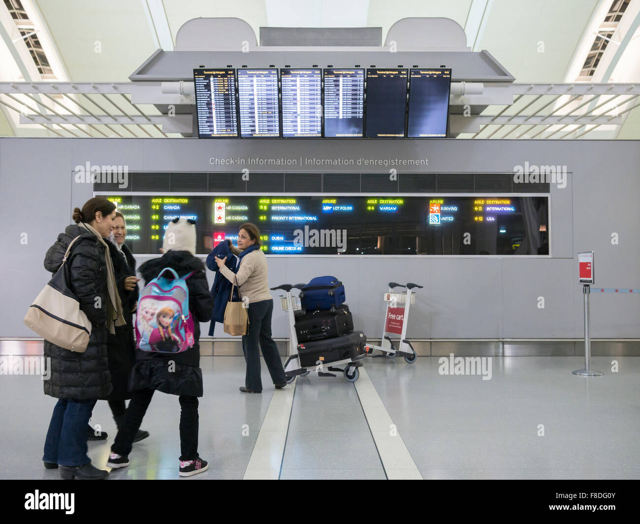 Passengers in Toronto international airport departure terminal. Stock Photo