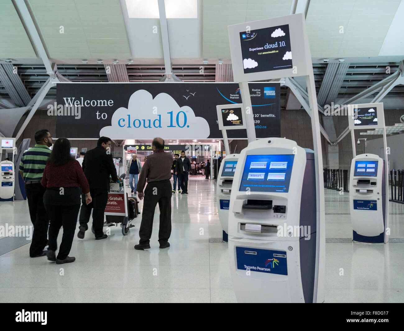 Passengers in Toronto international airport departure terminal. Stock Photo