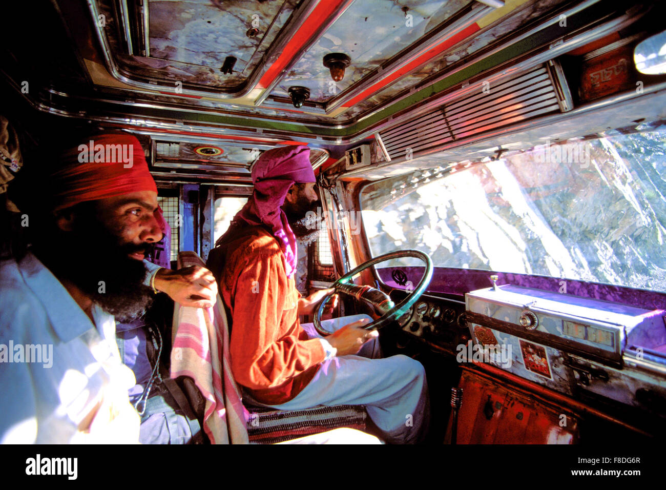 Indian Sikh drivers inside a local truck in India Stock Photo