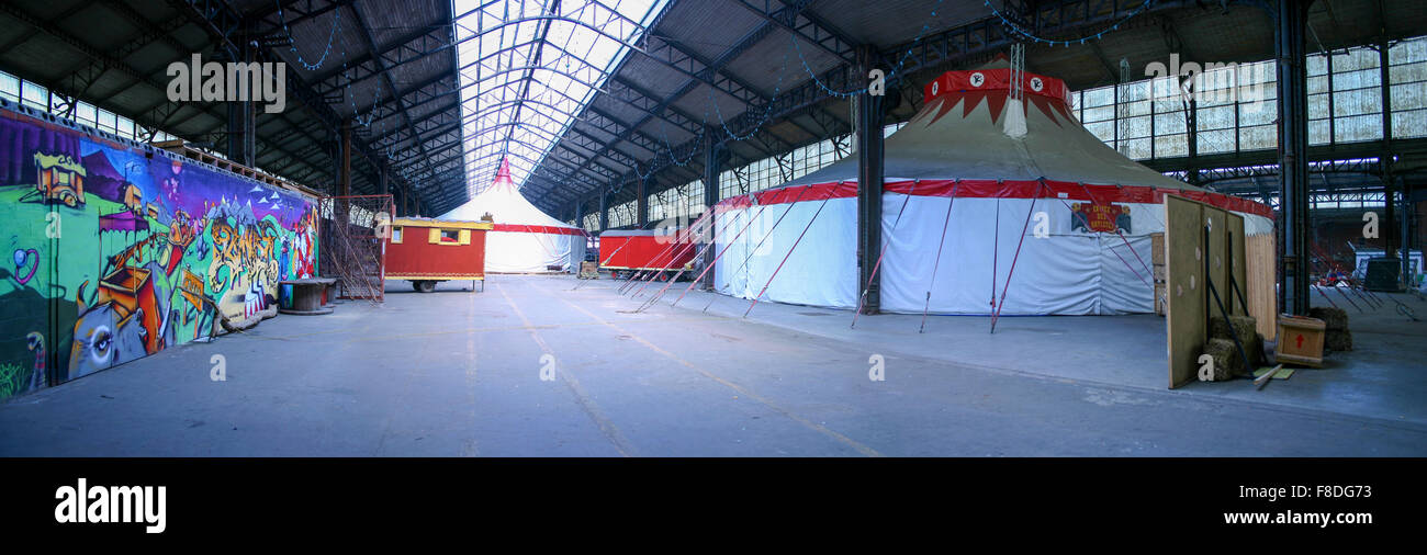 Red and white circus inside Tour et Taxi Stock Photo