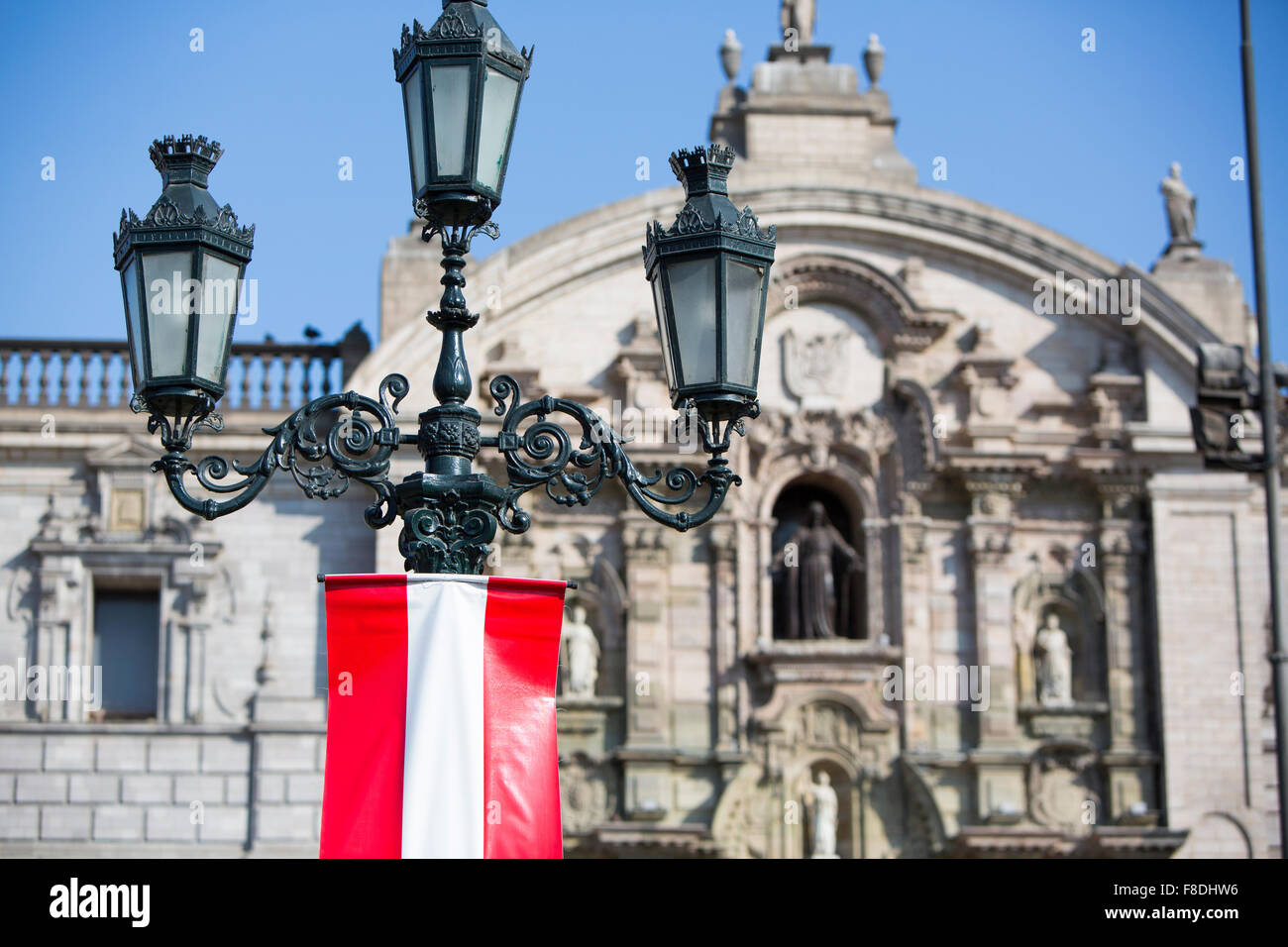 Old belvedere and flag from Peru on Plaza de Armas, Lima Stock Photo