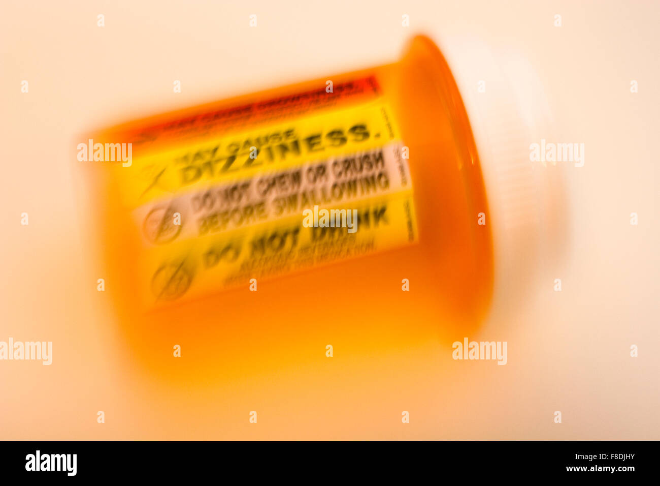 "May Cause Dizziness," warning label on prescription bottle Stock Photo
