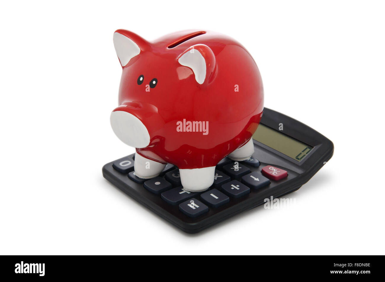 Calculator and piggy bank on white Stock Photo - Alamy