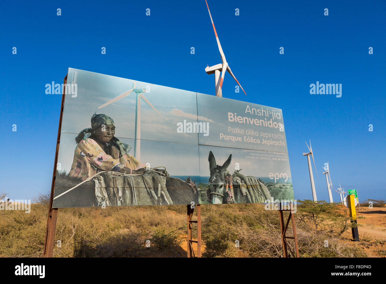 Wind mills in El Cabo De La Vela and sign board about Wayuu, Colombia Stock Photo