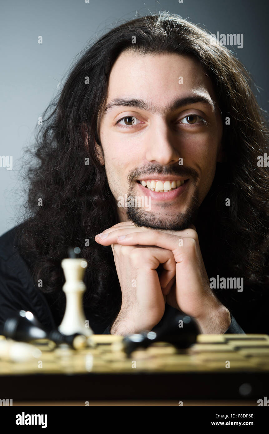 Chess player playing his game Stock Photo