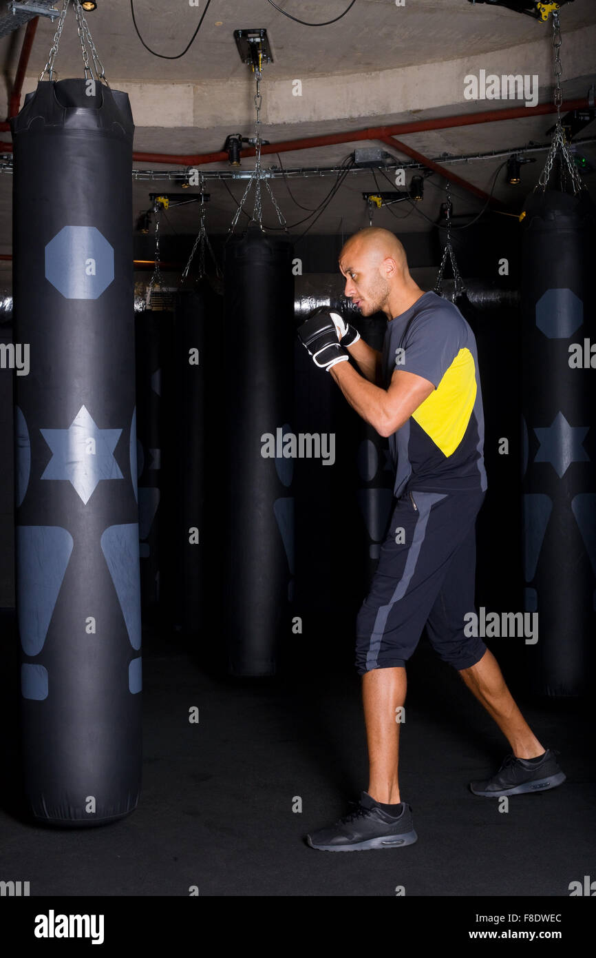 a boxer practicing at the boxing club Stock Photo