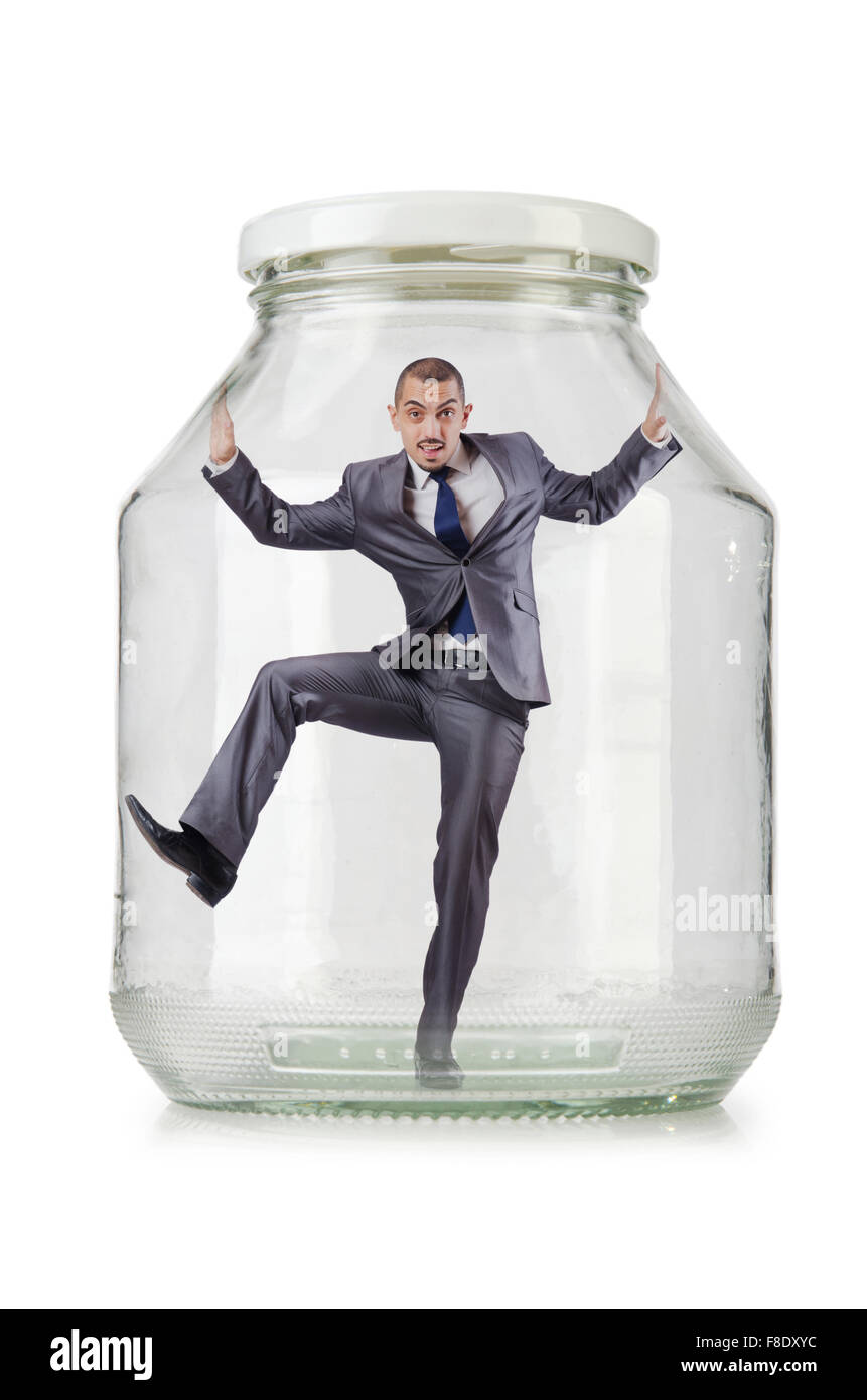 Young businessman in glass jar Stock Photo