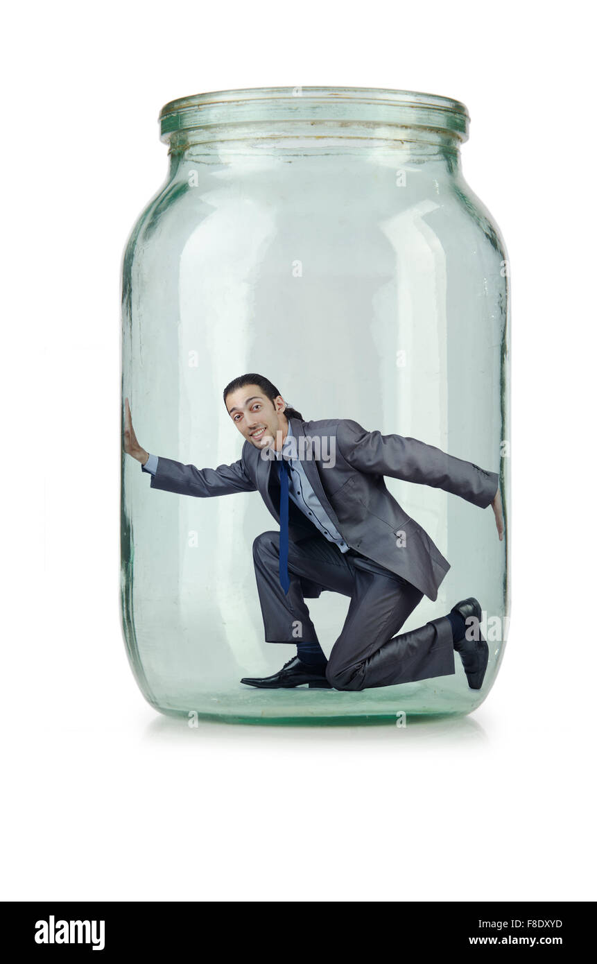 Young businessman in glass jar Stock Photo