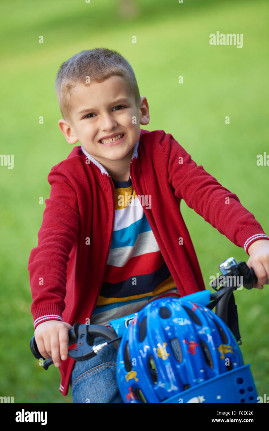 Young boy on the bicycle at Park Stock Photo Alamy